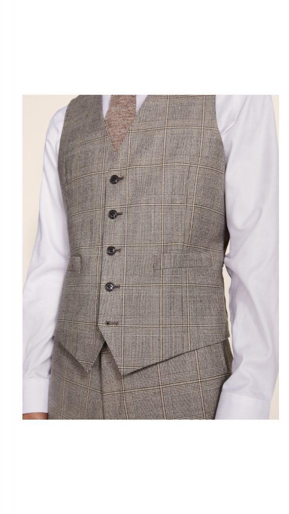 how to style a men's waistcoat; a checked waistcoat with white formal shirt 