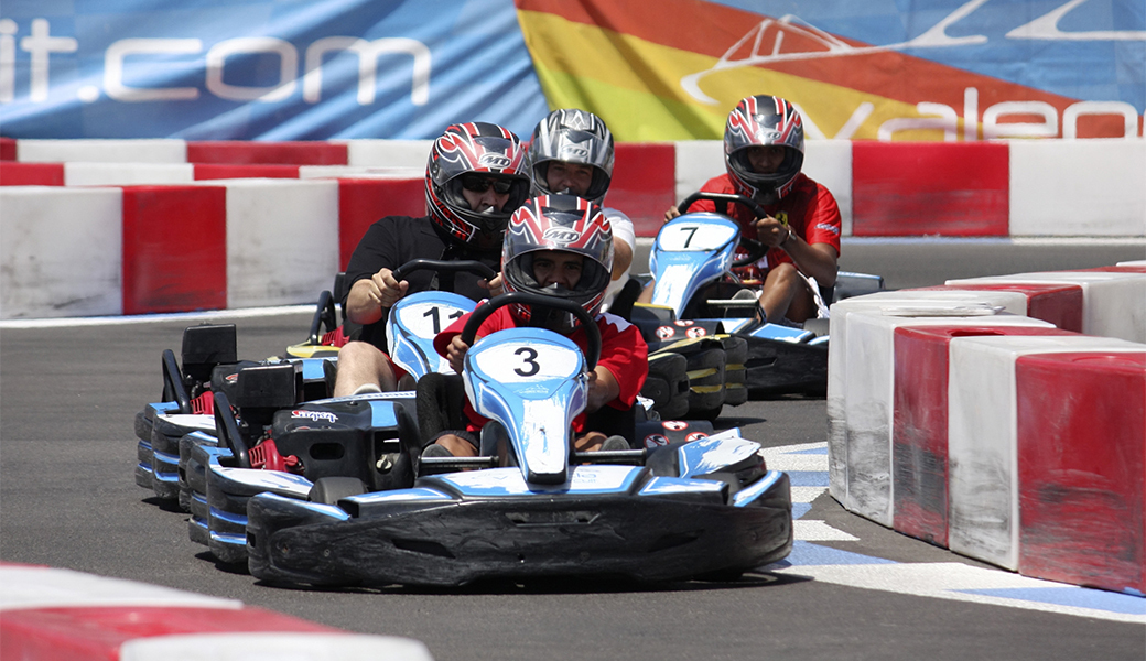 Men on a summer stag do go-karting in Valencia.